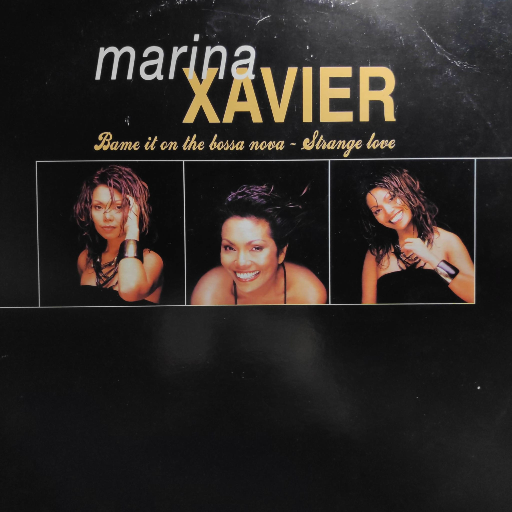(24353) Marina Xavier ‎– Blame It On The Bossa Nova / Stange Love (SOLO CARA B)