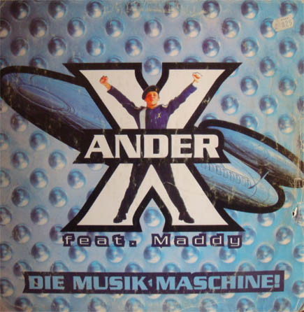 (CM549) X-Ander Feat. Maddy ‎– Die Musik Maschine